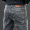 Jeans pour hommes gris foncé automne/hiver Stretch pantalon mince Plus velours épaississement 2023 mode pantalons décontractés