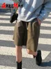 Shorts pour femme Short long en cuir noir coréen pour femme, avec poches, taille haute, jambes larges amples, manches longues, cuir Pu artificiel 230406