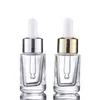 Bouteilles en verre transparent épais de forme carrée 15 ml 30 ml 50 ml avec compte-gouttes pour essence de lotion avec bouchon en argent doré