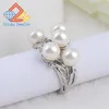 Cluster-Ringe Blumen-Finger-Edelstahl für Frauen Pearlr Mittlerer Ring Mode JewelryCluster