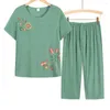 Kvinnors tvådelade byxor mjuka 2 st/set elegant midkalvmormer pyjamas set elastisk midja mamma blommor tryck damkläder
