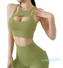 Yoga outfit Sexig kvinnors sportbh kvinnor tätt elastisk gym väst sport Bras BRALETTE CROP TOP HOLLOW OUT BROSS PAY avtagbar sportkläder