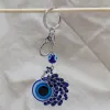 Keychains Lanyards L Evil Eye Metal Charm Key Chain Tassel Pendant Holder Car Rings Blue Pärlor för män Kvinnor Juvelrypeacock Drop Deliv Amqoi