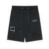 Designer célèbre conçoit des shorts pour hommes personnalisés sports décontractés d'été 2023 tendance été à la mode séchage rapide shorts de plage pour hommes noir et blanc taille asiatique M-3XL