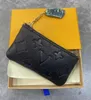 Met stofzakken en doos Dames Heren SLEUTELZAKJE POCHETTE CLES Ontwerpers Mode handtas Dames Heren Creditcardhouder Portemonnee Luxe Portemonnee Tas M62650