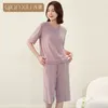 Kvinnors sömnkläder 2023 Summer Casual Pyjamas uppsättningar med bh damer bambu fiber kostym kvinnor kort ärm t shirt halva byxor hem kläder