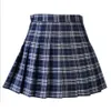 Kjolar kvinnor casual pläd kjol flickor hög midja veckad a-line mode uniform kjol med inre shorts 230413