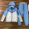 Projektant Tech polar Mens Tracksuit Kurtki zamek błyskawiczne i spodnie sportowe Zestawy Kobieta haftowane listu dress