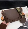 Damestas 2024 nieuwe bruine damestas one-shoulder messenger bag handtas klassieke modeketen tas hoge kwaliteit 23040