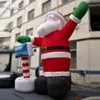 Attractive Giant Advertising Inflatable Santa Claus Balloon Saint Nicholas Red Air Blow Up Father Christmas With A Guideboard For Outdoor Event