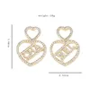 Womens 18k Gold Plated Stud Designer örhängen älskar bröllopsfest gåvor smycken charms örhängen hög känsla lång bokstav örhängen lyxsmycken