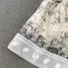 Letnia sukienka w stylu vintage liter splicowany atrament kwiatowy nadruk w talii opakowany w rękawie sukienka