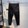 Mäns jeans designer svart grå för hösten 2023 Nytt modemärke avancerad ljus lyxiga smala passformar j3pm
