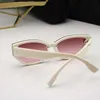 2023 Fashion Designer New Sunglasses Small Fragrant Trend Advanced Sense Cat Eye Network Red Resistant Women