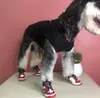 Scarpe per cani di marca Abbigliamento per cani di marca Scarpe antiscivolo per animali domestici Scarpe da ginnastica antiscivolo calde invernali Protezioni per zampe Set da 4 pezzi per sport da passeggio all'aperto Pavimentazione calda