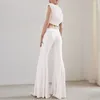 Calças femininas de duas peças Cutubly Sparkly White Outfits para mulheres 2 conjuntos de moda lantejoulas sem mangas colheita top slim flare senhora calça brilhante terno