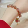 Charmarmbanden aankomst in Zuid -Korea Fashion Tassel Micro ingelegde zirkon Natural Strawberry Quartz Bead Bracelet Dames voortreffelijke sieraden YBR637 230406