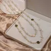 Halsketten Stränge Saiten Halskette Langer Stil Temperament Mehrschichtige duftende Perle Blume Pullover Kette Damen Koreanische Mode Vielseitige Kleidung Anhänger