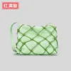 Small design mesh woven diamond grid single shoulder diagonal cross bag for women's ins hollowed out fishing net small square bag soft and solid color handbag 230406