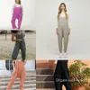 Commercio all'ingrosso Taglie forti Abbigliamento donna S-4xl Pantaloni lunghi Tasca con bretelle Tuta Pantaloni larghi in vita Pantaloni tinta unita Pagliaccetti Tute Donna