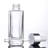 Bouteilles en verre transparent épais de forme carrée 15 ml 30 ml 50 ml avec compte-gouttes pour essence de lotion avec bouchon en argent doré