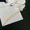 Designer bracelet, fashionable hot selling style, bronze 24K gold electroplate, Double chain Classic Alphabet and Pearl bracelet, Anniversary, Christmas, high quality