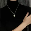 Colliers brins cordes fleur de camélia collier pour femme printemps/été 2023 nouveau pendentif perle parfumé vent collier lumière luxe petite chaîne de chandail