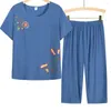 Kvinnors tvådelade byxor mjuka 2 st/set elegant midkalvmormer pyjamas set elastisk midja mamma blommor tryck damkläder