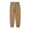 Diseñador para hombre Pantalones de chándal Hombres Mujeres Pantalones de chándal Joggers Pantalón Moda Hip Hop Ropa deportiva Casual Harem Pantalones de cintura elástica 247y