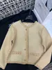 Damenjacken Designer Herbst/Winter 23 New Nanyou cel Temperament Kleiner Duft Slim Champagne Gold Fried Dough Twists Woven Edge Trim Button Short Coat CZJW