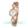 Wristwatches 100pcs/lot E-LY 011 Exclusive Fashion Lady Bracelet Watch Peal Belt Wrap Quartz Elegance Wholesale Clock For WomenWristwatches