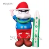 Toptan dev sörf şişme Noel Baba Modeli Reklam Airblown Santa Balon Açık Noel dekorasyonu için bir sörf tahtası tutuyor