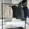 xuan Ropa de diseñador Chaqueta de plumas Chaqueta abrigada y resistente al viento Co-ed