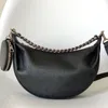 Half Moon Bag Echtes Leder geschnitzte Perforation Handtasche Metall gewebter Griff abnehmbare und verstellbare Kette Umhängetaschen