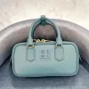 Arcadie Miui Lolita Bolso baguette de bolos de lujo Diseñador de mujer pochette Bolsos de mano cruzados Bolsos de mano de cuero genuino para hombre Bolsos de mano de viaje Bolsos de hombro para niña