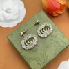 Projektantek Carring Letter Double G logo marka stadnina luksusowe kobiety moda biżuteria metal ggity kryształ perłowy palen