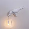 Lámparas de pared Nordic Art Deco Lámpara de pájaro de resina Elegante Dormitorio decorativo Mesita de noche Diseño de Italia Corredor Café Apliques Accesorio de iluminación