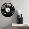 壁時計ロンドンの黒い家の装飾は珍しいクリエイティブレコード指の目覚まし時計丸い装飾サロンを吊るす