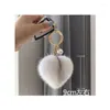 Porte-clés de haute qualité moelleux véritable boule pompon coeur forme porte-clés anneau en métal pendentif sac charme pour les femmes X256