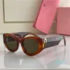 Lunettes de soleil tendance de la mode pour les femmes vintage glamour cadre ovale lunettes loisirs d'été