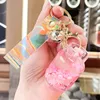 exquisite bag keychain Acrylic glow-in-the-dark gas canister key chain Quicksand bottle pendant decoration wholesale