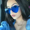 2023 Fashion Rimless Heart Candy Color Solglasögon Kvinnors glasögon solskugga solglasögon 7zk2i4i4p