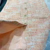 Diseñador de mujer vestidos de punto de lujo 2023 pasarela de verano falda delgada vestido rosa de manga corta botones de moda simple canal cerrado
