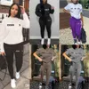 2023 Kvinnor Tracksuits Sweatpants Suit Designer 2 Piece Set Fall Wear Hoodie Coat Autumn Winter Warm Fashion Letters Jacquard Street Outfits
