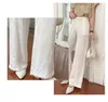 Spodnie damskie satynowe vintage 2023 Spring/letnie kieszenie fałdowe odzież Wysoko drukowana luźna szeroka noga ycmyunyan