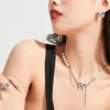 Chaînes Gland Papillon Collier Titane Acier Micro-set Gem Perle Pendentif Designer Bijoux Pour Femmes Lumière De Luxe De Mode