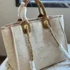 Marca de luxo designer bolsas femininas sacola de compras de alta qualidade lona moda grande saco de praia alça de couro viagem axilas crossbody saco