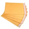 Nouveau 100pcs / lots Bubble Mailers Sacs Enveloppes rembourrées Emballage Sacs d'expédition Kraft Bubble Mailing Enveloppe Sacs 130 * 110mm Cbmgr