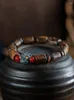Ensemble collier et boucles d'oreilles Vietnam Nha Trang, Bracelet en aloès, 12 signes du zodiaque en forme de perles de bouddha immergées en vieux matériau