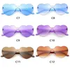 2023 Fashion Rimless Heart Candy Color Solglasögon Kvinnors glasögon solskugga solglasögon 7zk2i4i4p